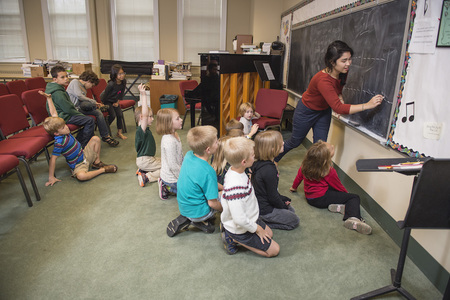 Student Teaching Children About Music